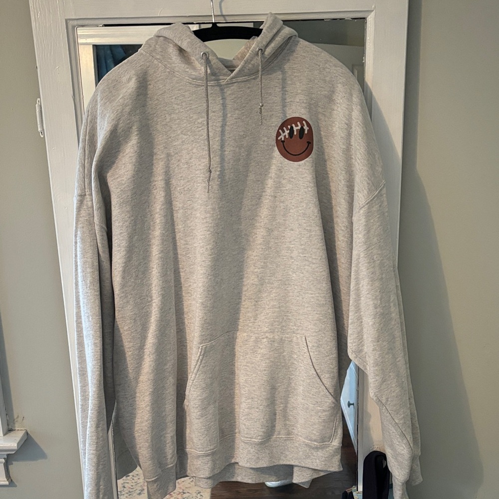 Jerzees Light Gray Hoodie with Brown Smiley Logo